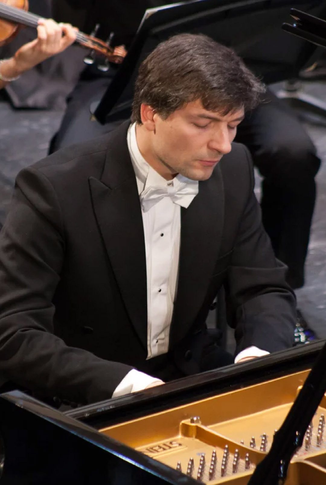 Pianist Konstantin Shamray is acclaimed both as a performer and educator. A Senior Lecturer in Piano at the University of Melbourne and a Doctor of Music in theory from the University of Adelaide, Shamray rose to international prominence after winning First Prize at the 2008 Sydney International Piano Competition, alongside numerous other top awards.